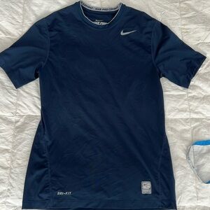 New without tags, Nike pro combat fitted compression T-shirt. Size small.